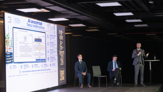 Attēlā konferenču zāle ar dalībniekiem