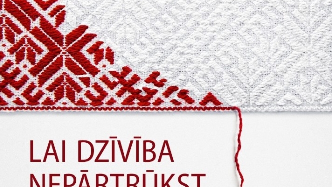 Irstoša Lielvārdes josta un uzraksts "Lai dzīvība nepārtrūkst".