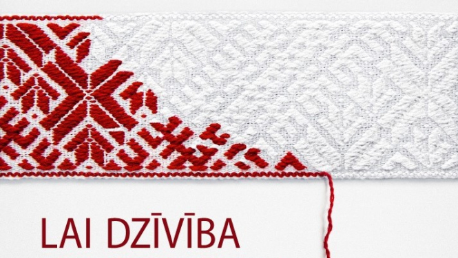 Irstoša Lielvārdes josta un uzraksts "Lai dzīvība nepārtrūkst".